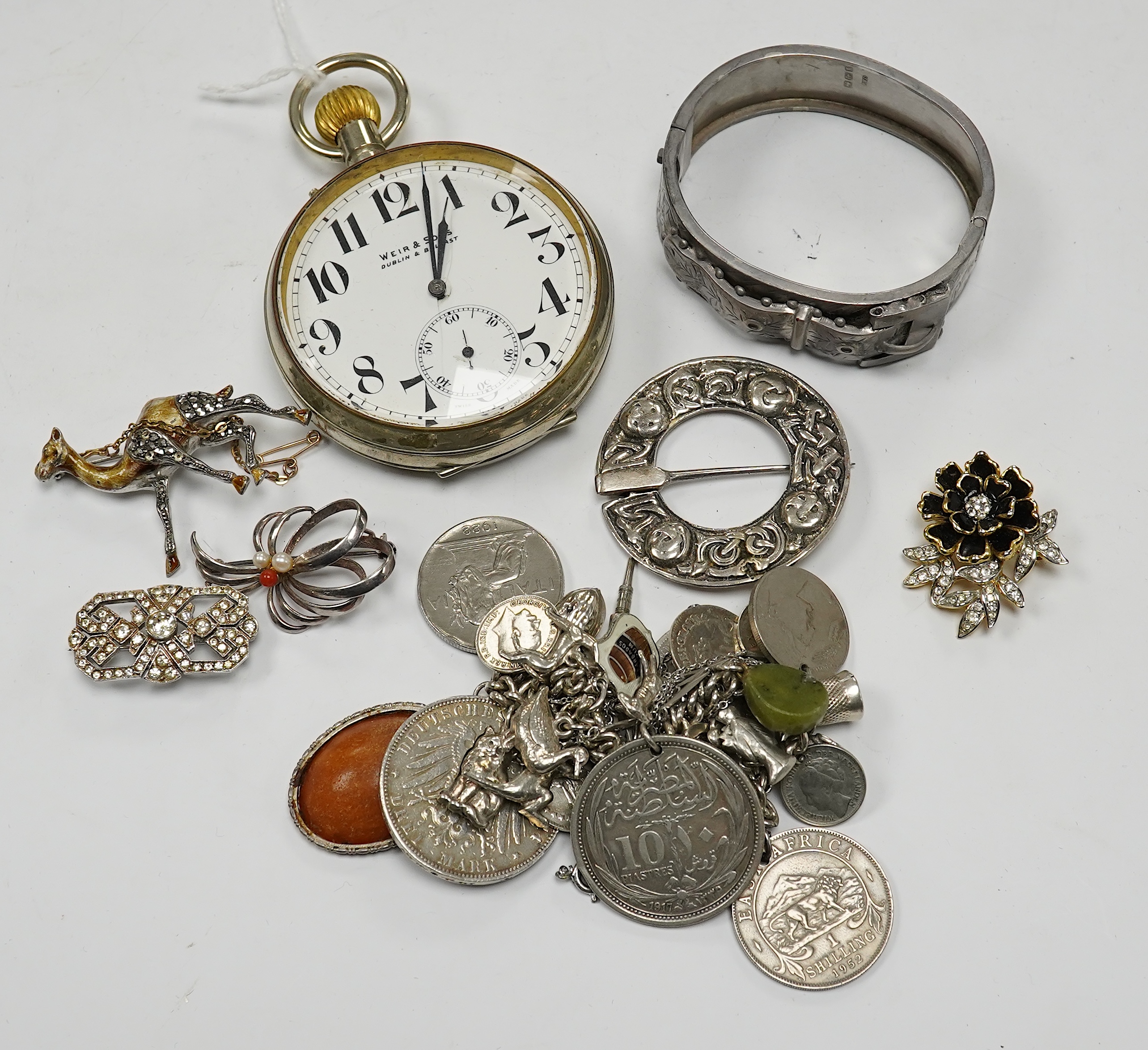 Assorted jewellery etc. including a silver bangle, a white metal Celtic style brooch and a Weir & Son nickel cased pocket watch. Condition - poor to fair to good.